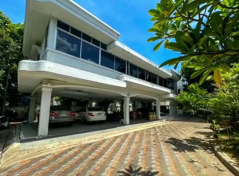 Two-storey office building with covered parking beneath