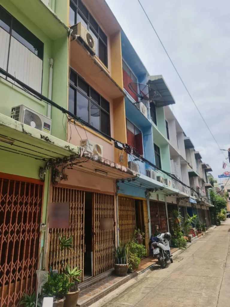 Front of the 3-storey shophouse with a folding gate