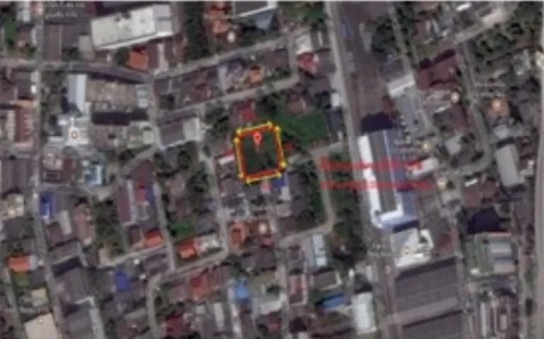 Close aerial view of the almost square plot