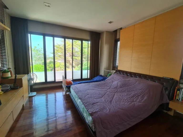 Master bedroom with large windows
