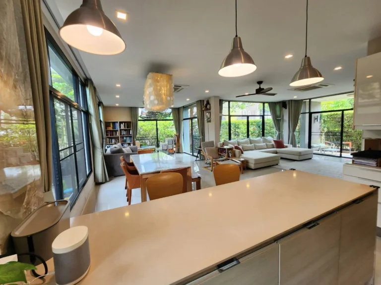 Open-plan living and dining seen from the kitchen