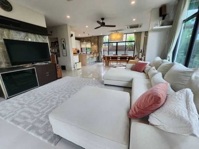 Living room with a marble-look TV wall